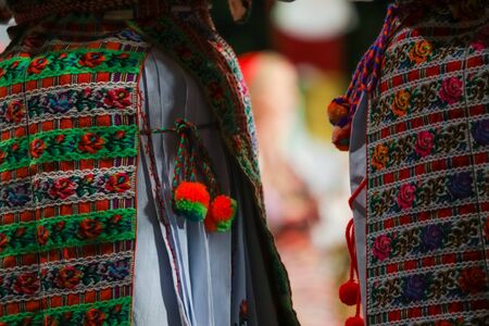 Close up on detail of young Romanian female dancer traditional folkloric costume. Folklore of Romaniaの写真素材