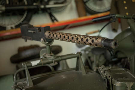 Pancevo, Serbia - September 27, 2019: Machine gun on Old timer motorcycle parked in collectors museum.のeditorial素材