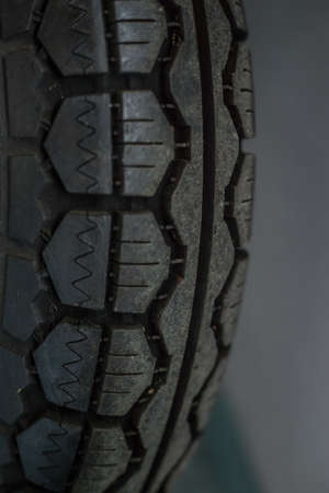 Pancevo, Serbia - September 27, 2019: Tire of Old timer motorcycle parked in collectors museum.のeditorial素材