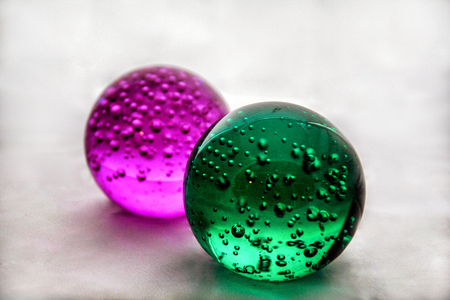 Color glass balls with a white backgroundの写真素材