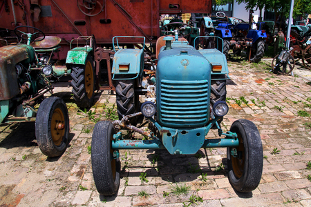 Old tractors on waste agricultural machineryの写真素材