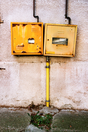 Protective metal box of gas meter on the wall of the houseの写真素材