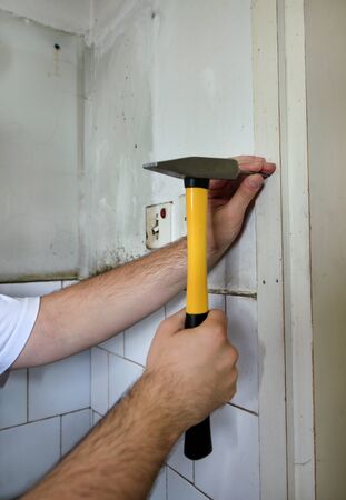 Construction worker and handyman working on renovation work.の写真素材