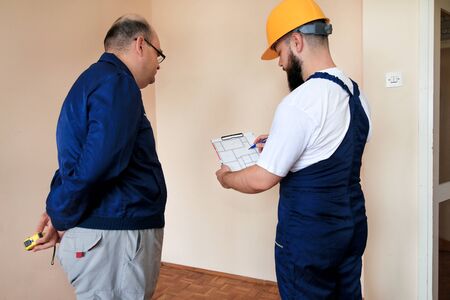 Engineer, contractor and project manager with their colleague or partnership construction worker and...