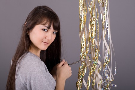 Girl with tinselの写真素材