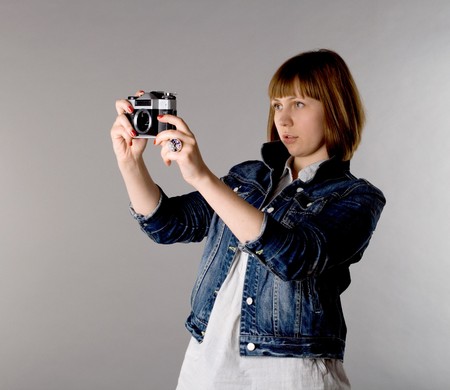 Girl with a cameraの写真素材
