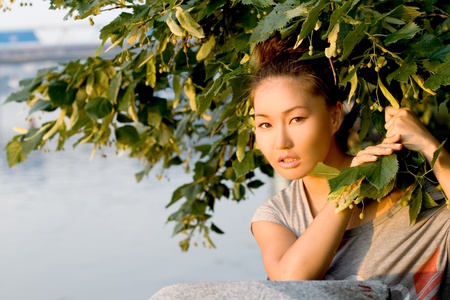 Girl walking outdoor in summerの写真素材