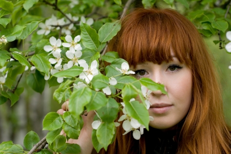 Portrait of a girl walking in park in summerの写真素材