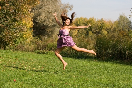 Joyful girl having fun outdoorの写真素材