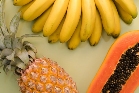 Fruit place for inscription. A set of Thai fruits on a blue background with a place for writingの写真素材