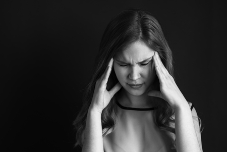 Pain girl head weight photo in BW close-upの写真素材