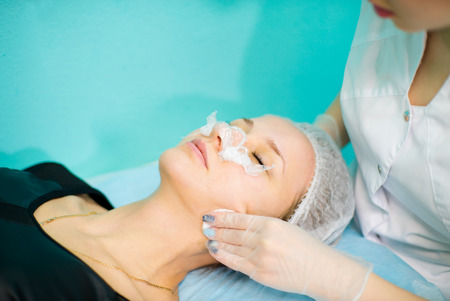Doctor beautician cleansing faceの写真素材