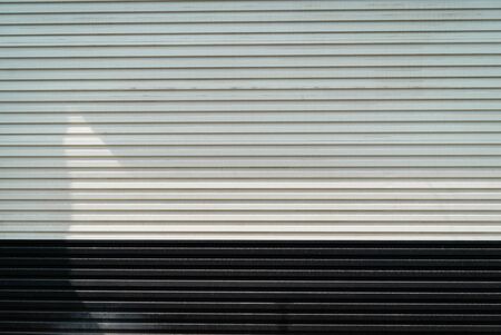 metal striped plate background texture Iron gate white black fenceの写真素材