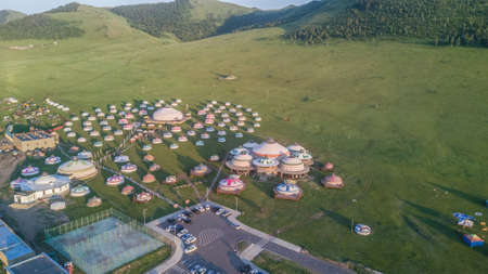 camping from yurts in a mountain valley in Mongoliaの写真素材