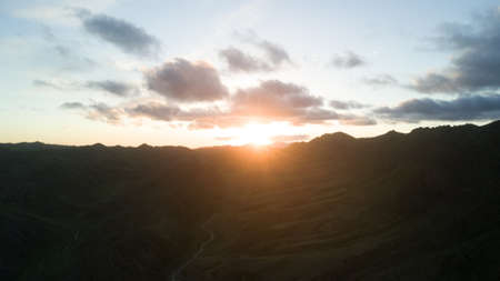 mountain view in the mongolian desert sunset on the background of mountainsの写真素材