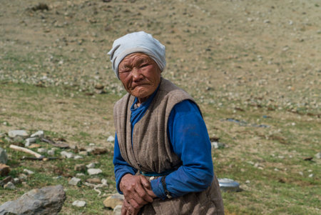 Mongolian elderly woman looking at the camera