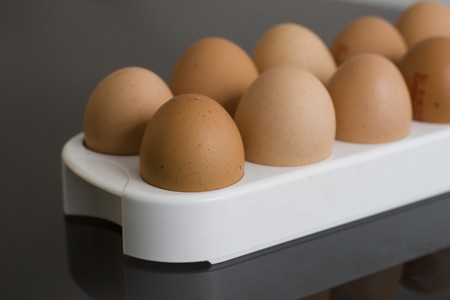 Eggs and egg tray brokenの写真素材