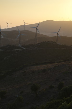 Sunset in a field of wind turbines in southern Spainの写真素材