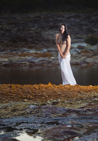 Nude Romanian woman in nature in Rio Tinto, Spainの写真素材