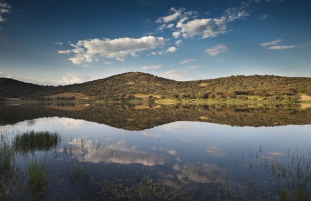Landscape reflected in a lake of Spainの写真素材