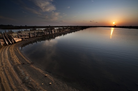 Sunset on the salt Bacuta, Odiel Natural Park in Huelva (Spain)の写真素材