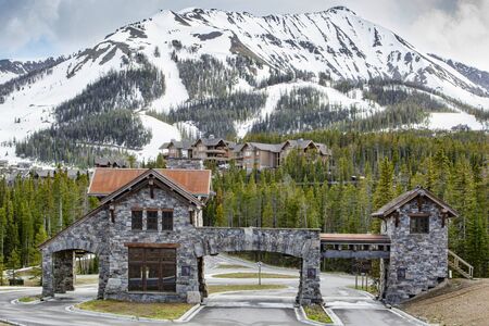 moonlight basin entrance against pine trees and mountains, Southwestern Montana, USAのeditorial素材