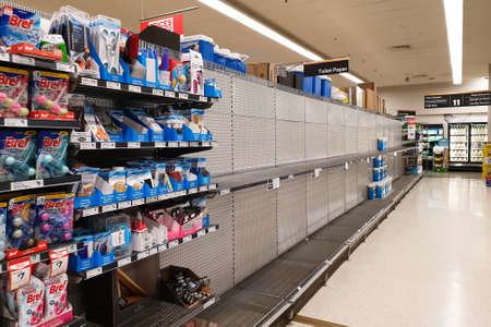 Gold Coast, Australia - March 8, 2020: Coles supermarket empty toilet paper shelves amid coronavirus...