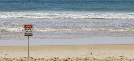 beach closed, covid 19 virus, beach closed or shutdown concept amid coronavirus fears and panic over...