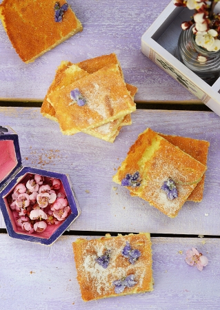 Custard Cake and violet flowers 