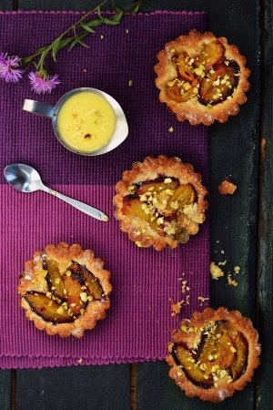 plum pastry with creme anglaiseの写真素材