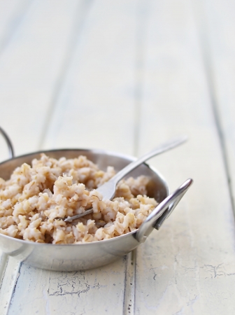 barley groats with salmon  in a plateの写真素材
