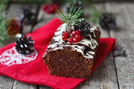 Christmas chocolate cake on Christmas backgroundの写真素材