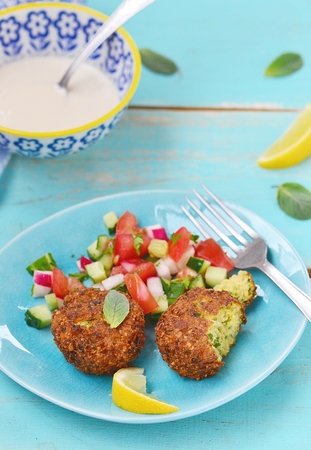 falafel with tehina  sauce and vegetable salad