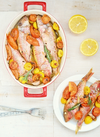 	baked surmullet with cherry tomatoes,garlic and rosemary