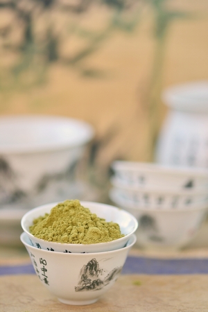 matcha green tea in to the tea cupの写真素材