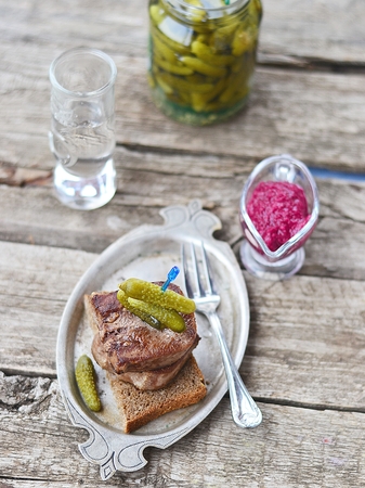 Veal tongue appetizer with gherkin and horseraddishの写真素材