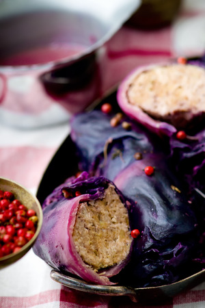 cabbage rolls  from red cabbage with meat and pink pepper sauceの写真素材