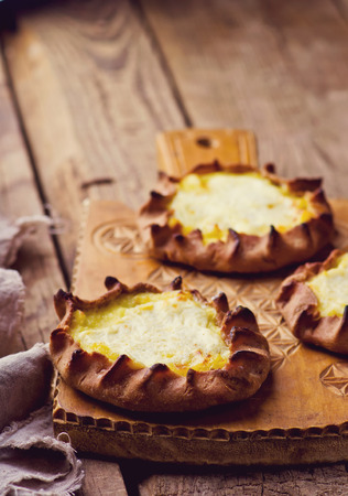 kalitka, traditional russian potato pie from rye dough. style rustic.の写真素材
