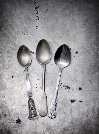 Vintage tableware on a metal の写真素材