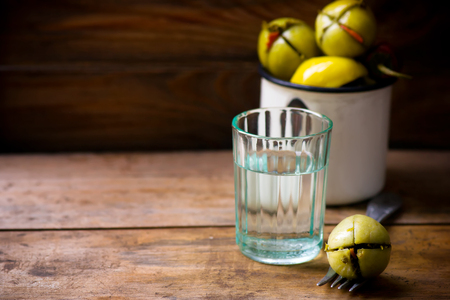 marinated spicy green tomatoes. style rustic. selective focusの写真素材
