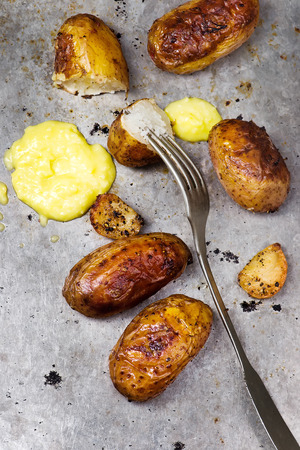 roasted potato with sauce. style vintage. selective focusの写真素材
