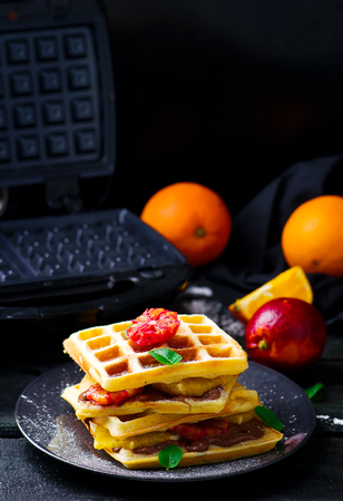 Vaffles with nutella and orange .selective focusの写真素材