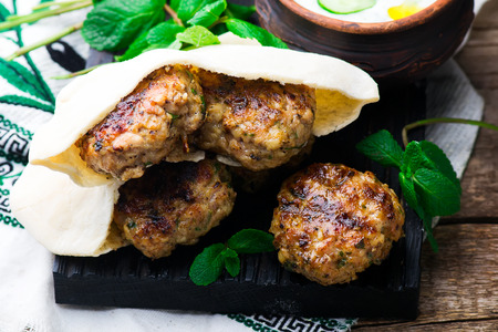 Chicken Kafta Kebabs with pita and tzatziki.selective focusの写真素材