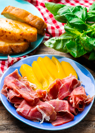 Prosciutto and mango.selective focus.style rusticの写真素材