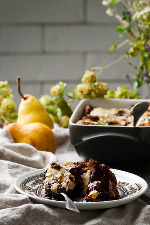 Squidgy chocolate pear pudding. selective focusの写真素材