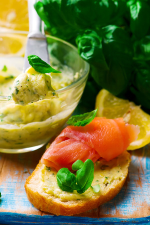 Butter with a basil and a lemon for sandwiches. selective focusの写真素材