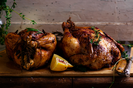 SUMAC ROAST CHICKEN WITH LEMON AND GARLIC..style rustic.selective focusの写真素材