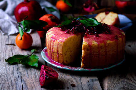 tangerine bundt cake with pomegranate glaze. selective focusの写真素材