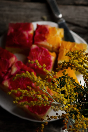 UPSIDE DOWN OMBRE ORANGE CAKE WITH VANILLA..rustic style.selective focusの写真素材
