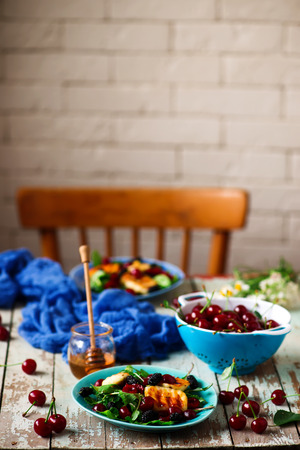 Grilled halumi  cheese salad with berries.food gathering.selective focusの写真素材
